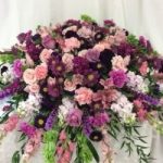 Purple, pink, and white flower arrangement