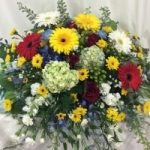 Red yellow and white flower arrangement